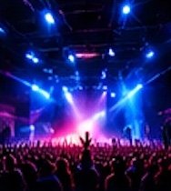 Concert crowd under stage lights